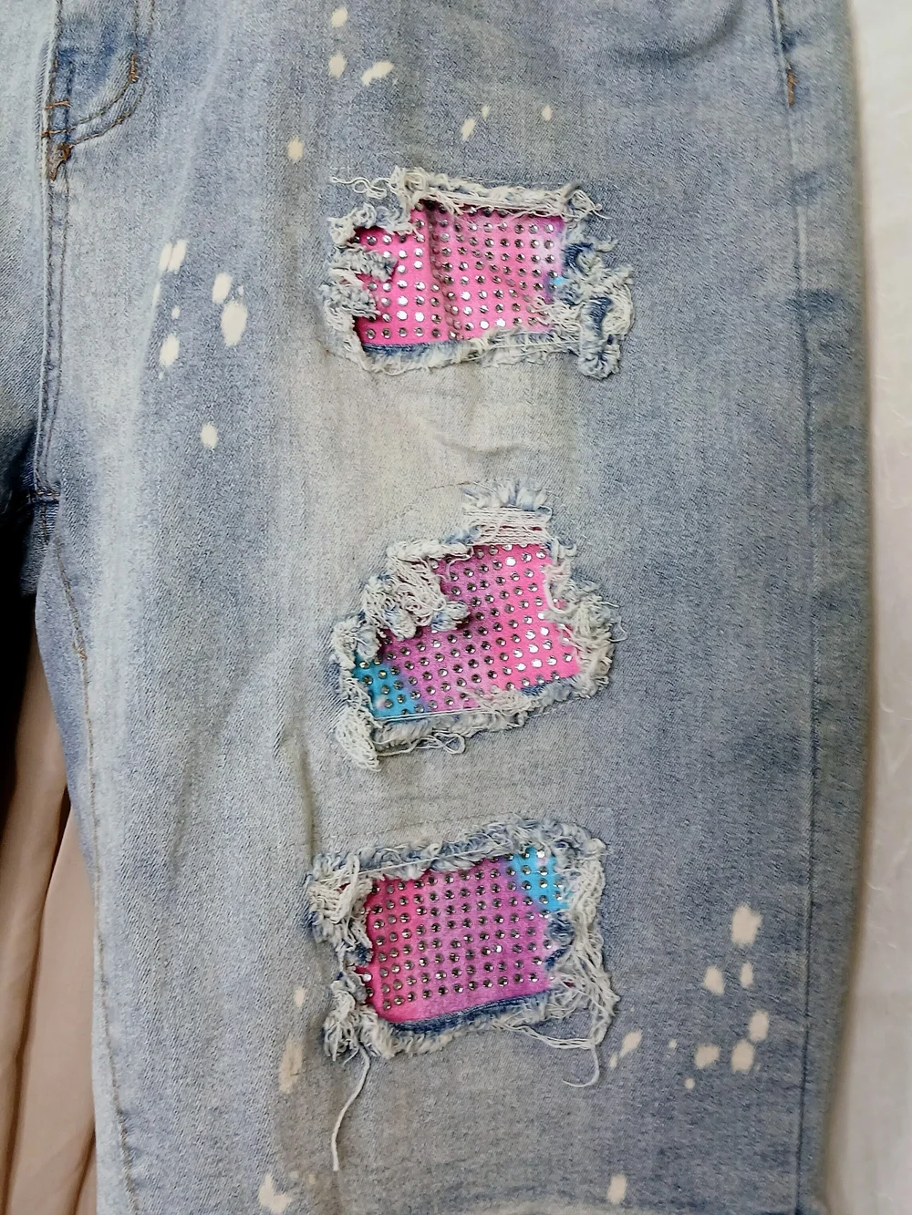 Light Blue Distressed Men’s Jean Shorts with Iridescent Patch Details